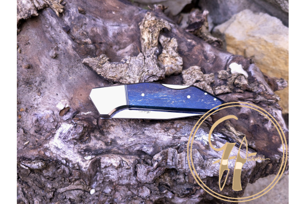 baclock_folding_knife_cubism_ats-34_titanium_bolster_liner_mirror_polished_blade_stabilized_mammoth_fosil_handle_colored