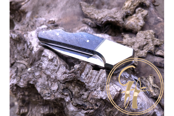 baclock_folding_knife_cubism_ats-34_titanium_bolster_liner_mirror_polished_blade_stabilized_mammoth_fosil_handle_colored_2