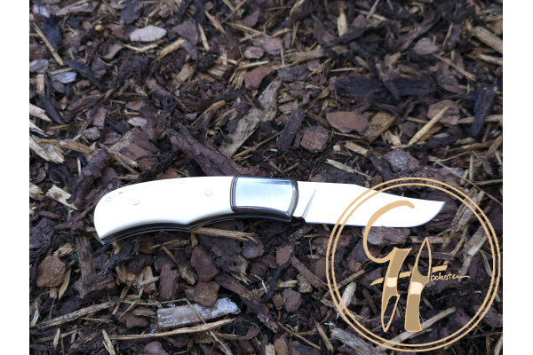 trapper_rwl-34_stainless_steel_63hrc_warthog_tusk_titanium_slipjoint_leather_sheat_4