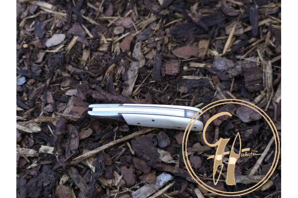 trapper_rwl-34_stainless_steel_63hrc_warthog_tusk_titanium_slipjoint_leather_sheat_5